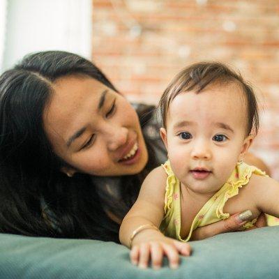 Joni playing with her baby