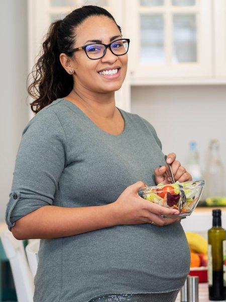 Nikia eating a salad